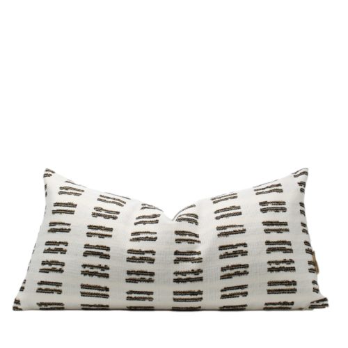 white geometric pillow